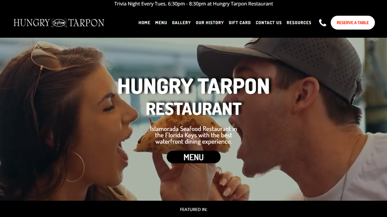 Hungry Tarpon Restaurant homepage — cafe at Robbie's Marina in Islamorada with menu, hours, and dining-room photography